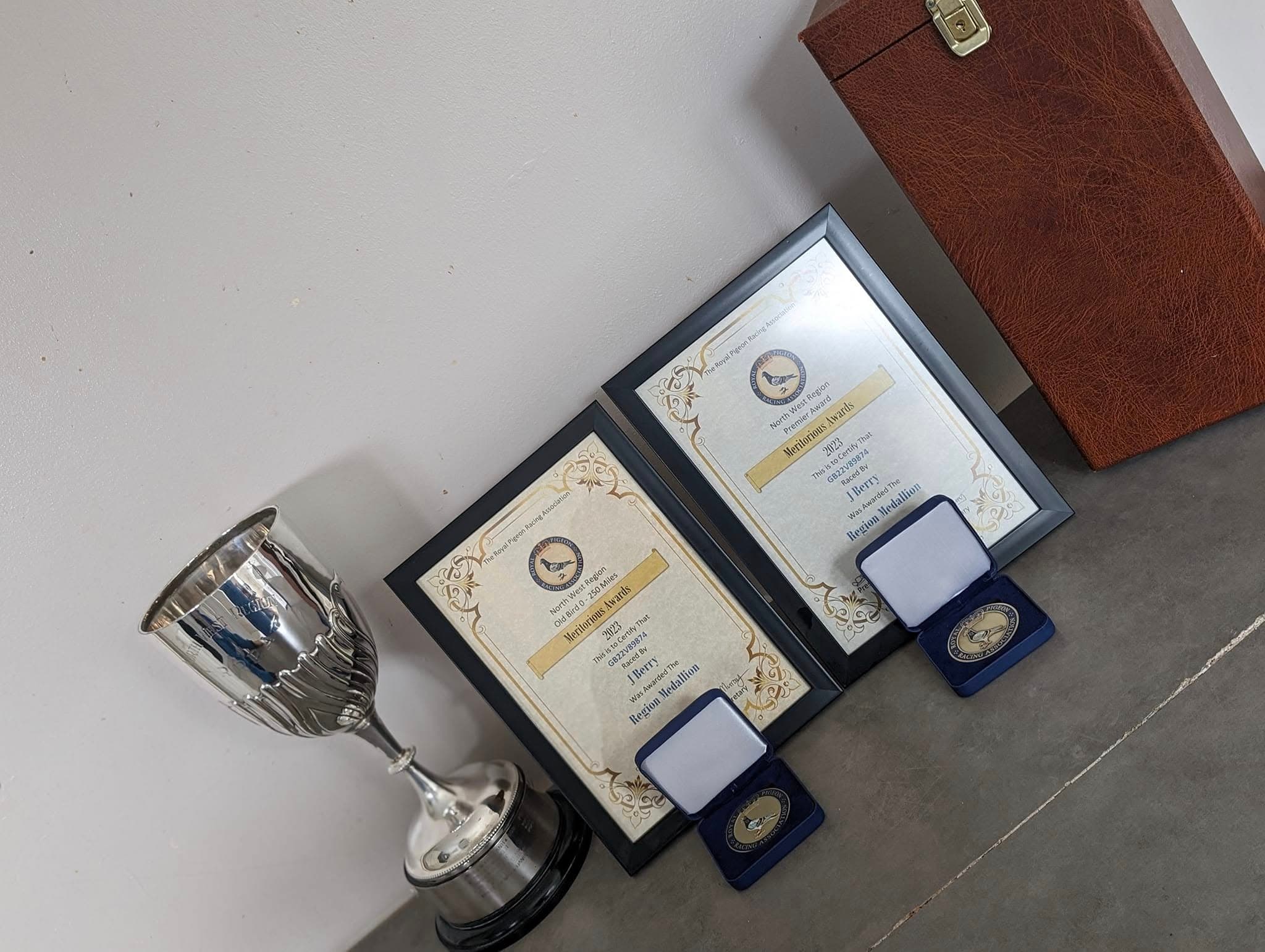 RPRA awards display with trophy and certificates